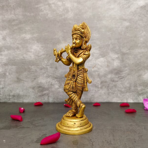 Brass krishna idol/statue height 9 inches