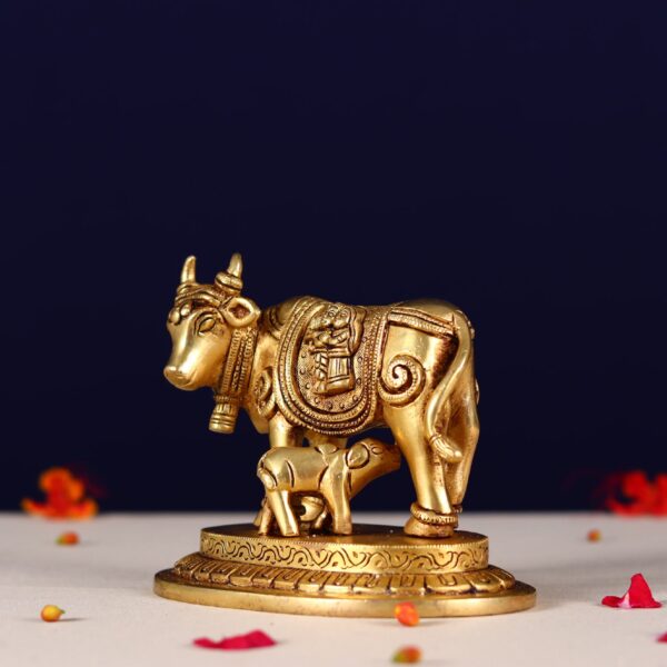 Brass kamdhenu carving with radha krishna