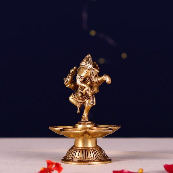 Brass five petal diya with dancing ganesh