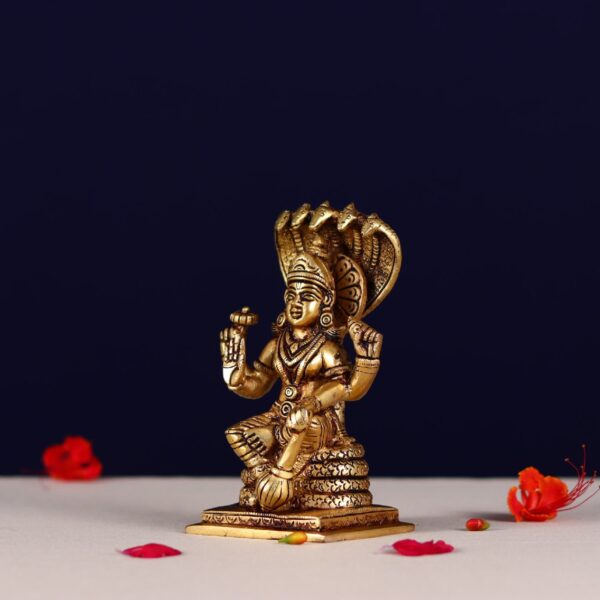Brass lord Vishnu murti sitting on shesh nag