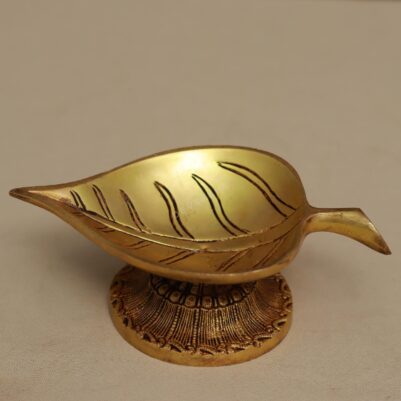brass oil diya in leaf shape height 2.5 inch