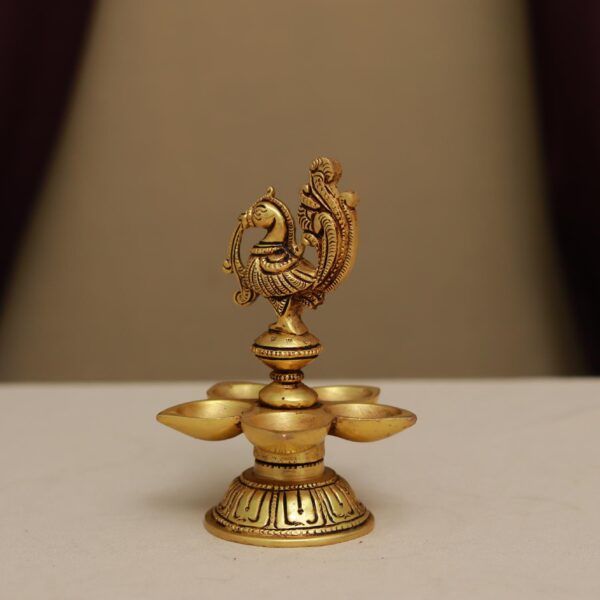 Brass five petal diya with peacock