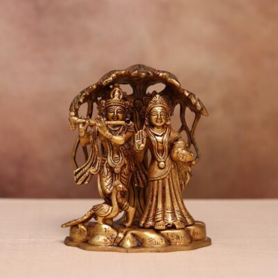 Brass Radha Krishna idol with tree and peacock  7.4 inches