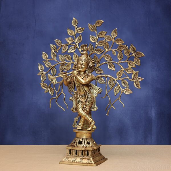 Brass krishna idol with tree height  21 inches